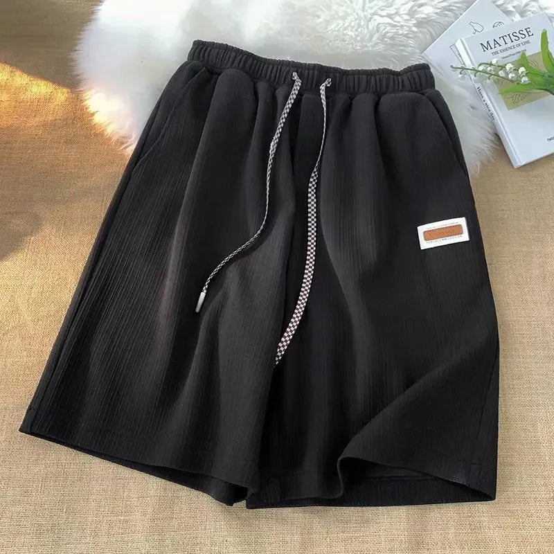 Summer thin shorts men's new style ice silk loose breathable hanging feeling student five quarter pants embroidered logo straigh