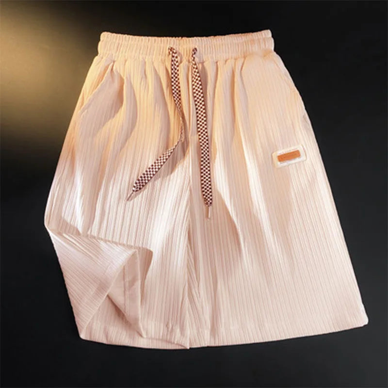 Summer thin shorts men's new style ice silk loose breathable hanging feeling student five quarter pants embroidered logo straigh
